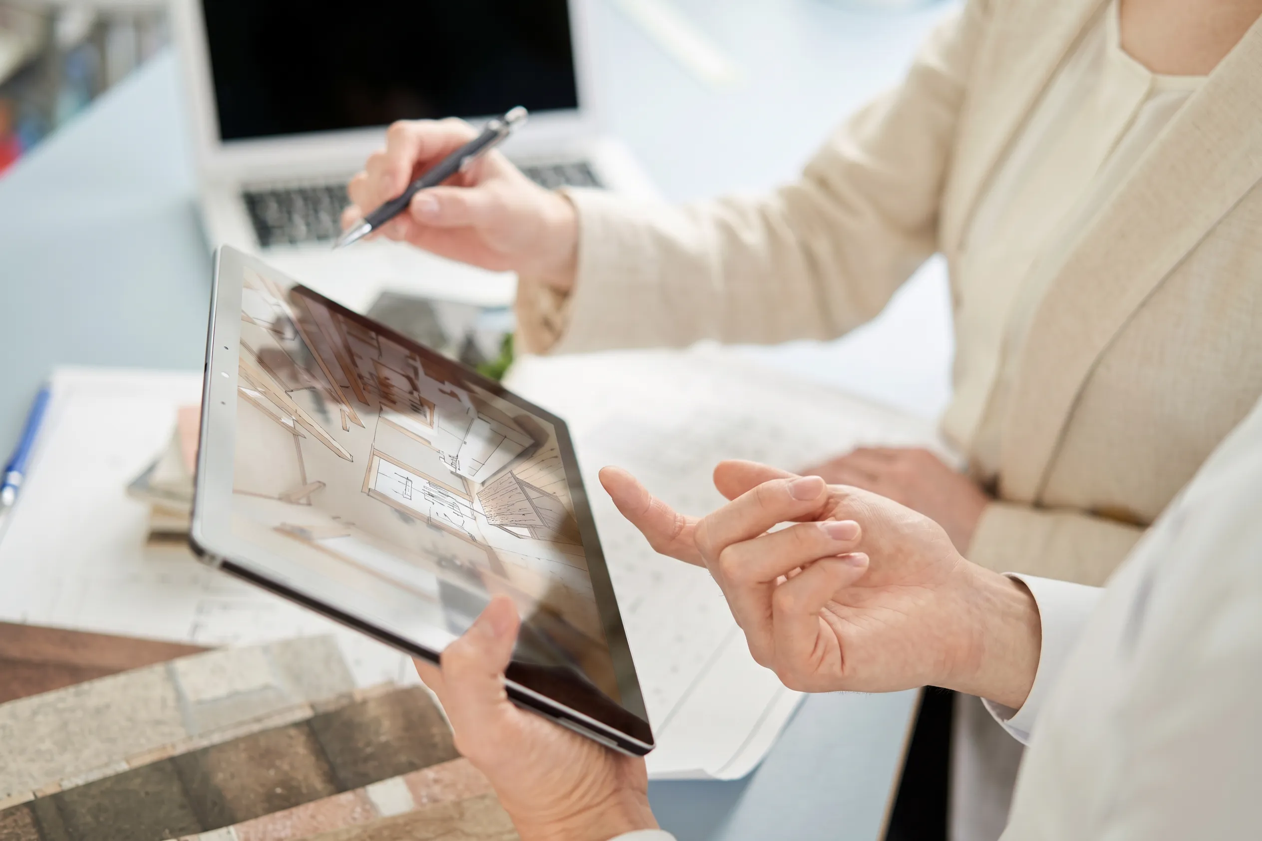 Design consultant meeting with a homeowner