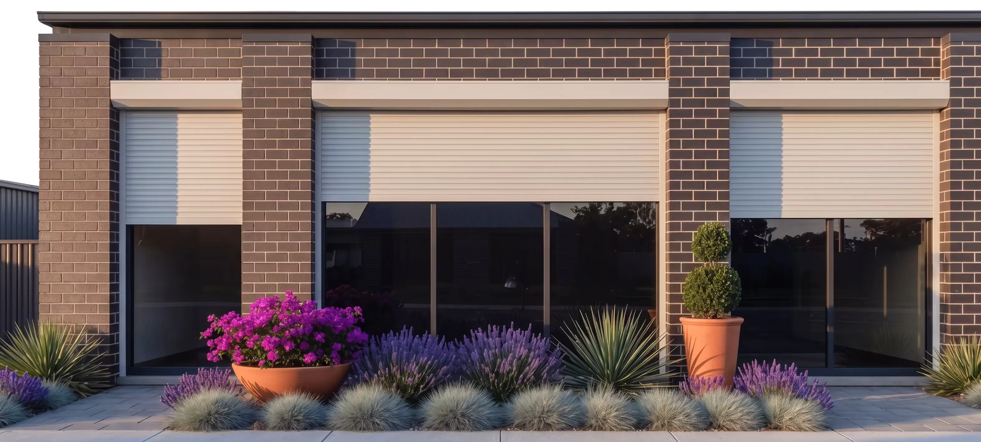 Modern roller shutters fitted across a row of Australian homes